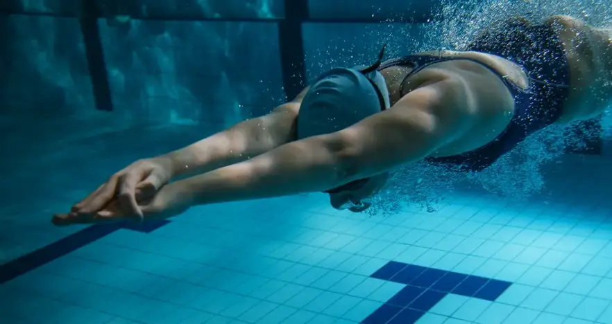 Swimmer diving under water