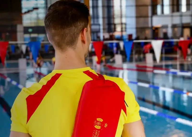 Lifeguard looking over pool