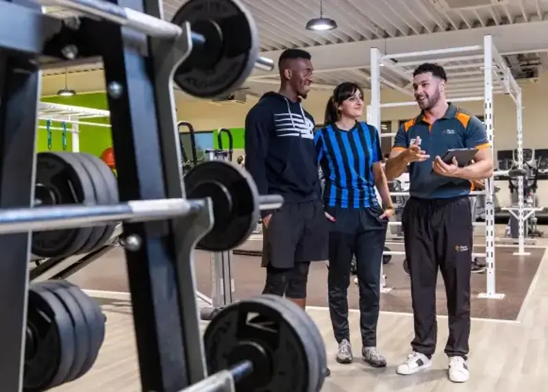 Placemaker giving a tour of the gym