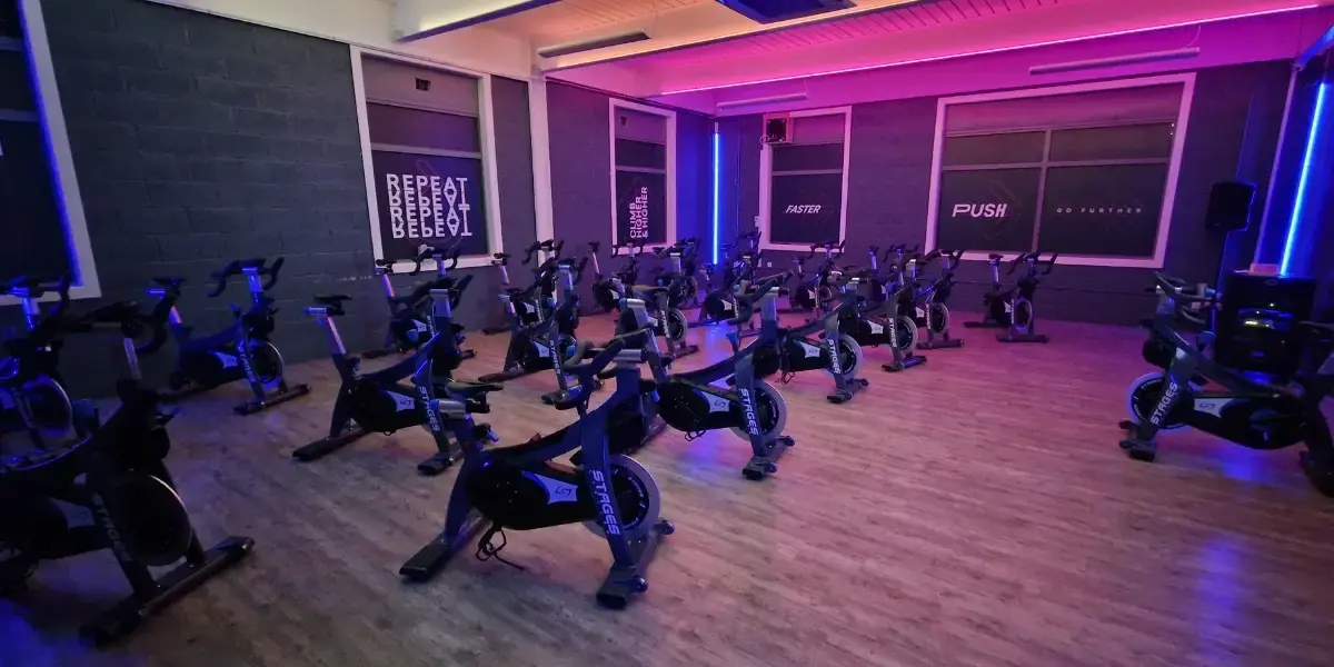 View of group cycling studio at Places Gym Hinckley