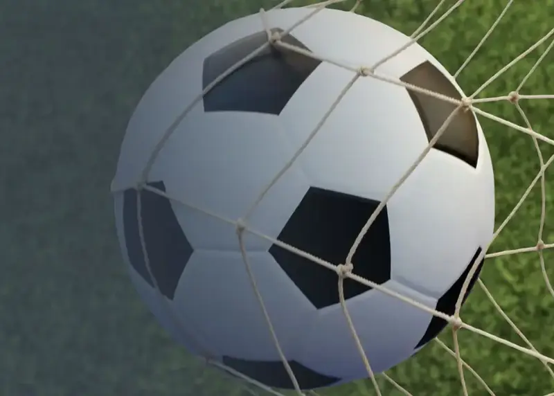 Close up of football in net